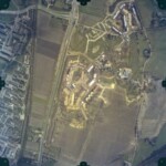 luchtfoto bouw winkelcentrum flora 1984 Colmschate